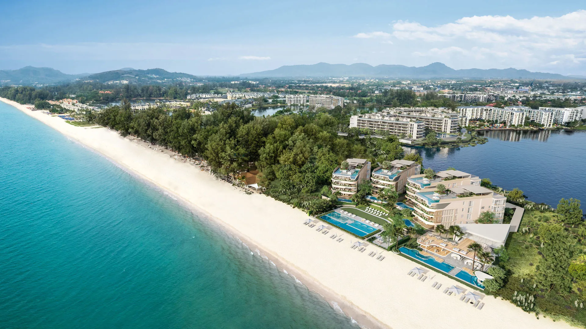 Aerial view of an exclusive, modern beachfront residence on Bang Tao Beach, highlighting its prime location on the sand within the Laguna Phuket integrated resort.
