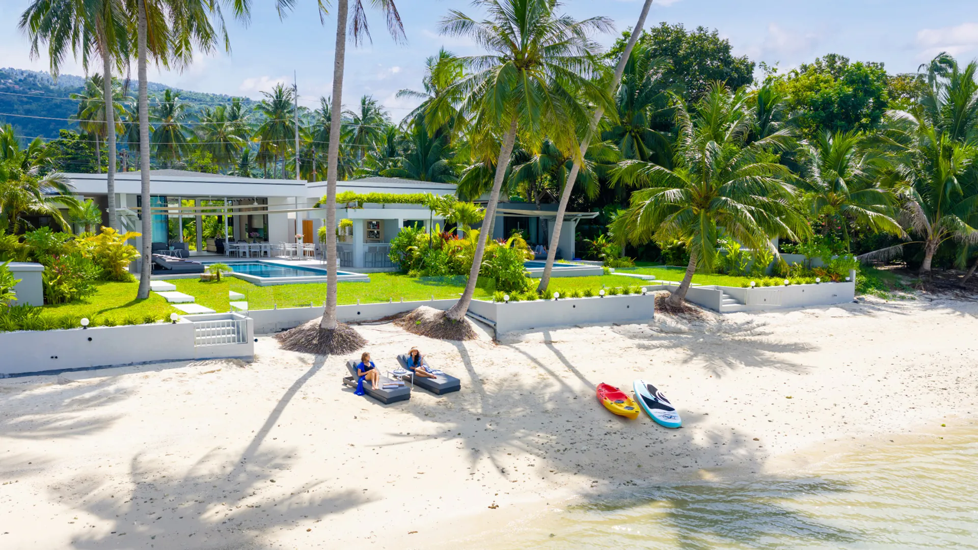 Luxury beachfront villa in Koh Samui with private pool, tropical garden, and direct access to the white-sand beach